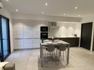 Appartements Maison Appart, Le Cocon Brindasien, 20 min de Lyon, 66 m2 : photos des chambres