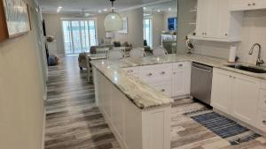 105 - First floor steps away from the pool