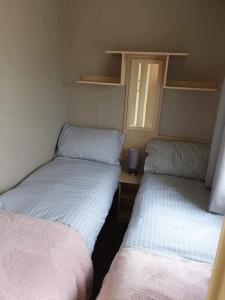 PALM GROVE PG33 3 BED DELUXE CARAVAN GOLDEN PALM