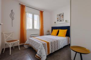 Maisons de vacances Mimosas - Maison plain pied climatisee : photos des chambres