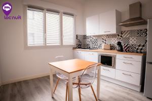 Loc'Nuit - Appartements Tout Confort - Hyper Centre AGEN : photos des chambres