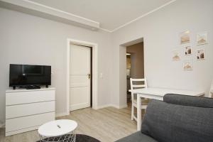 nah am Meer, ruhige Lage, gratis Nutzung vom AHOI Erlebnisbad und Sauna in Sellin - Haus Büdnerstube FeWo 2