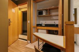 1707 Flat com duas suites com serviço de Hotel no Itaim Bibi!