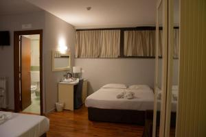 Economy Quadruple Room room in Capodichino International Hotel