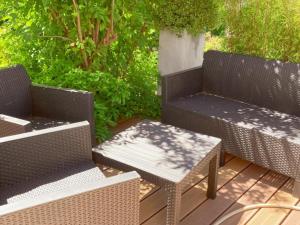 Maisons de vacances Gite tout confort avec terrasse spacieuse, jardin clos et equipements modernes, a 45 mn du Mans - FR-1-381-557 : photos des chambres