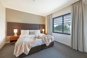 Breezy Harbourfront Resort Escape with Tropical Pool