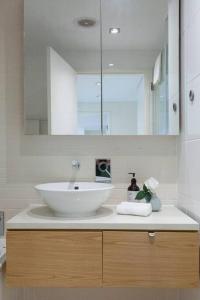 Waterfront Wonder Expansive Indoor-Outdoor Haven