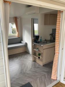 Villages vacances Mobil-home 4 places climatise dans camping 4* : photos des chambres