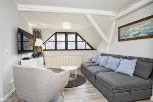 nah am Meer, ruhige Lage, gratis Nutzung vom AHOI Erlebnisbad und Sauna in Sellin - Haus Büdnerstube FeWo 4