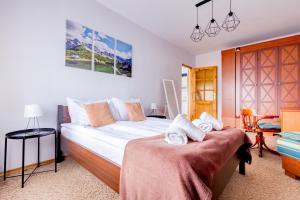 Apartament Rodzinny Tatra Giewont View Skibówki 11A by RentiloPL