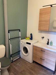 Appartements Charmant appartement avec jardin : photos des chambres