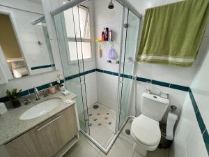 Home 43| Apto em cond Pé na Areia em Bertioga