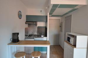 Appartements Studio Albatros en RDJ avec Terrasse, Parking prive, Piscine, proche Golf St Donat : photos des chambres