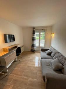 Appartements Charmant studio proche gare RER : photos des chambres