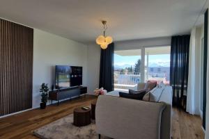 Visionary Hospitality Rothenburg, Lucerne - Premium Apartments with Free Parking, Washer, Kitchen, Terrace, Bus Stop, 15 City