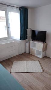 Appartements Studio proche du centre-ville : photos des chambres