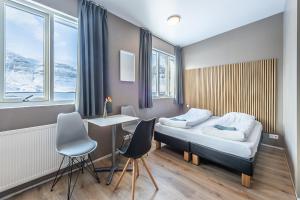 Family Room with Sea View room in Stöð Guest house and apartments