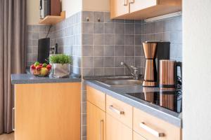Antares Spiekerooger Gästehaus-Sonnengartenbalkon Süd mit Blick aufs Wattenmeer - Wohnung 7