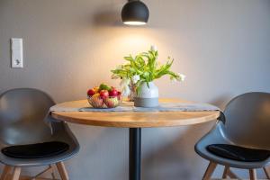 Antares Spiekerooger Gästehaus-Sonnengartenterrasse West - Wohnung 8