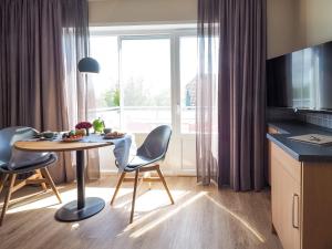 Antares Spiekerooger Gästehaus-Sonnengartenbalkon SüdWest - Wohnung 4