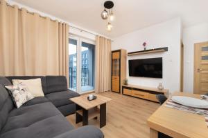 Modern Apartment with Parking & Near Manufaktura in Łódź by Noclegi Renters
