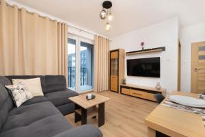 Modern Apartment with Parking & Near Manufaktura in Łódź by Renters