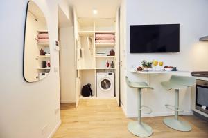 Suite Sanzio 14 - vicino a Fiera Milano City e Stadio