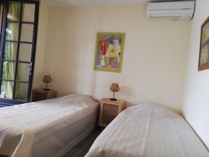 Maisons de vacances LA VALANAIS - Maison de Vacances entiere climatisee avec piscine privee : photos des chambres