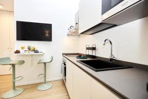 Suite Sanzio 14 - vicino a Fiera Milano City e Stadio