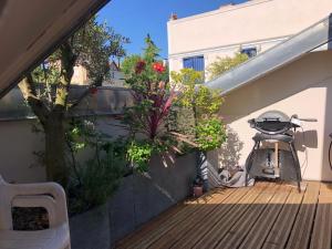 Appartements Superbe loft climatise a Suresnes avec terrasse : photos des chambres