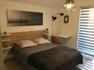 Sejours chez l'habitant Chambre confortable avec une entree independante - Parking & acces Lille facile : photos des chambres