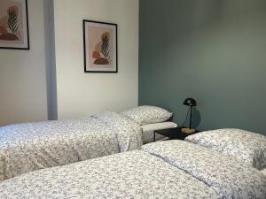 Maisons de vacances Charmante Maison de 3 Ch avec Jardin et Parking : photos des chambres