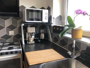 Appartements Pause au pied des Cevennes : photos des chambres