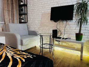 Kameralna kawalerka w stylu loftu blisko centrum