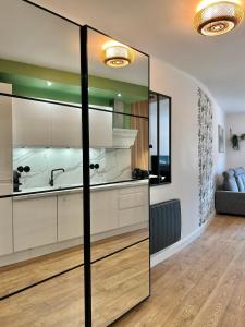 Le Chardon- appartement 2chambres- avec stationnement