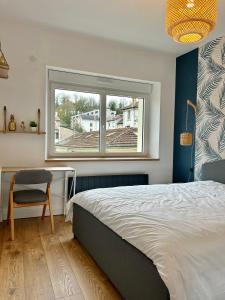 Le Chardon- appartement 2chambres- avec stationnement