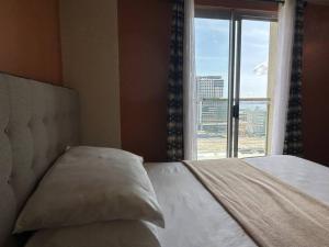 Condo with Balcony - MIGAs Haven at Sunvida Tower