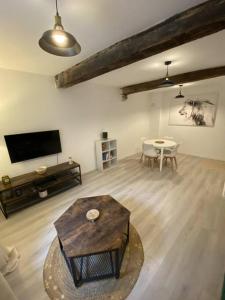 Appartements Maison village renovee tout equipee : photos des chambres