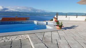 Apartment with private pool and beautiful sea view - by Traveler tourist agency Krk - ID 2106