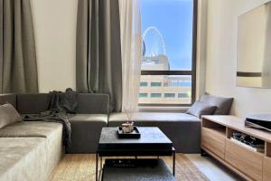 FavDubai presents 2BR apartment in The Heart of JBR and Dubai Marina 150 m to JBR Beach with famous Ain Dubai view the biggest ferris wheel in the world Swimming pool access, air-conditioned gym, free parking & Housekeeping