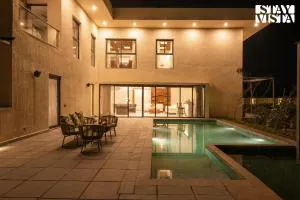 StayVista's The Sweet Life - Farm-View, Pet-Friendly Villa with Outdoor Pool, Terrace & Fireplace - Pīrthala