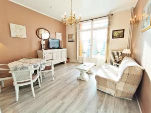 Appartements Le Petit Paradis, T3, wifi, parking, veranda : photos des chambres