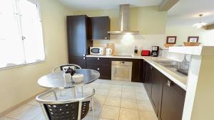 Villas Jolie maison familiale avec jardin et parking : photos des chambres