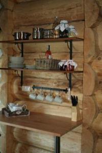 Chaty Świerkowe Wzgórze - domki typu superior z sauną balią kominkiem i domki-bez sauny balii kominka