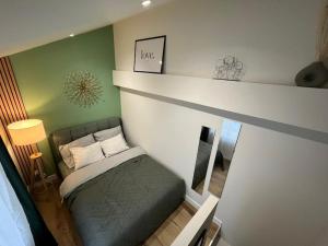 Appartements Une mise au vert en centre ville : photos des chambres