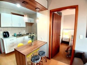 Siga Gramado - Apto faça tudo a pé! Vista! Tv smart! Ar Cond!