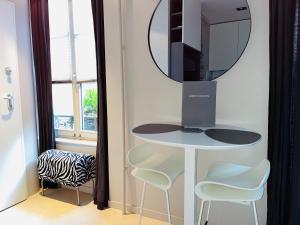 Appartements Studio design Nuee bleue tout equipe centre ville : photos des chambres