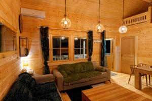 Chalets Autour de l'etang 86 : photos des chambres