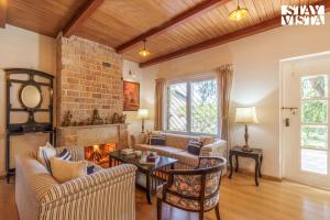 The Deck by StayVista - Country house architecture with Valley View