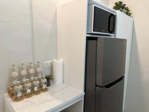 Japandi Home B - Fully Aircon, WIFI, Hot shower, 24hGuard, Center, near Malls